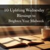 A cozy morning scene with sunlight streaming through a window onto a wooden table. A steaming cup of coffee sits beside an open journal and pen. Text overlay reads, "10 Uplifting Wednesday Blessings to Brighten Your Midweek." The atmosphere is warm and peaceful.
